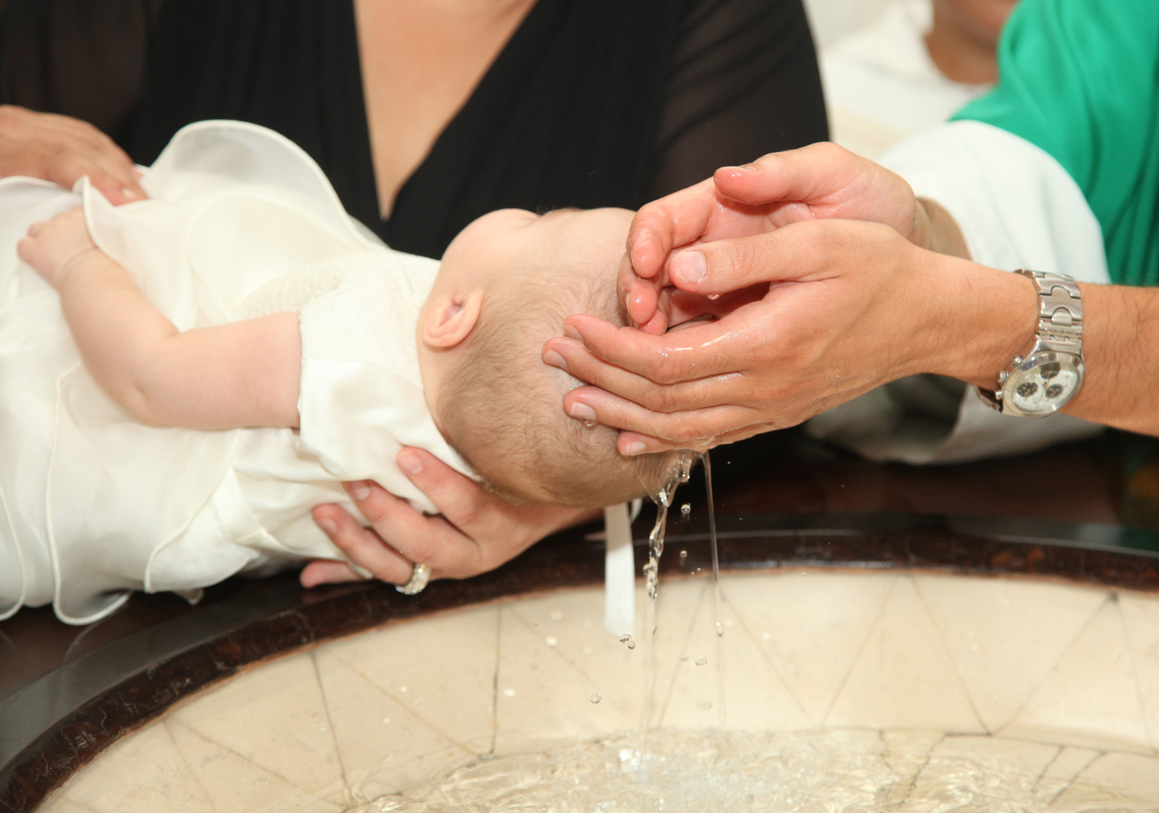 Baptism: meaning, symbols and how to organise one
