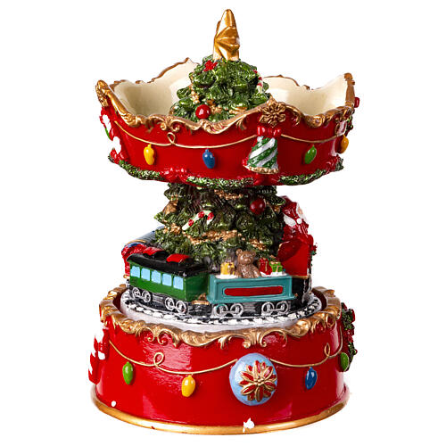 Christmas carousel music box with Santa Claus on the train 15x10x10 cm